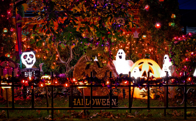 A halloween-decorated front yard