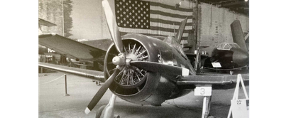 A black and white historic photo of a world war 2 plane
