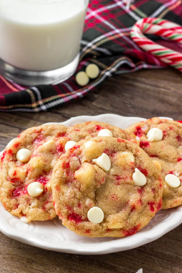a plate of white chocolate chip cookies.