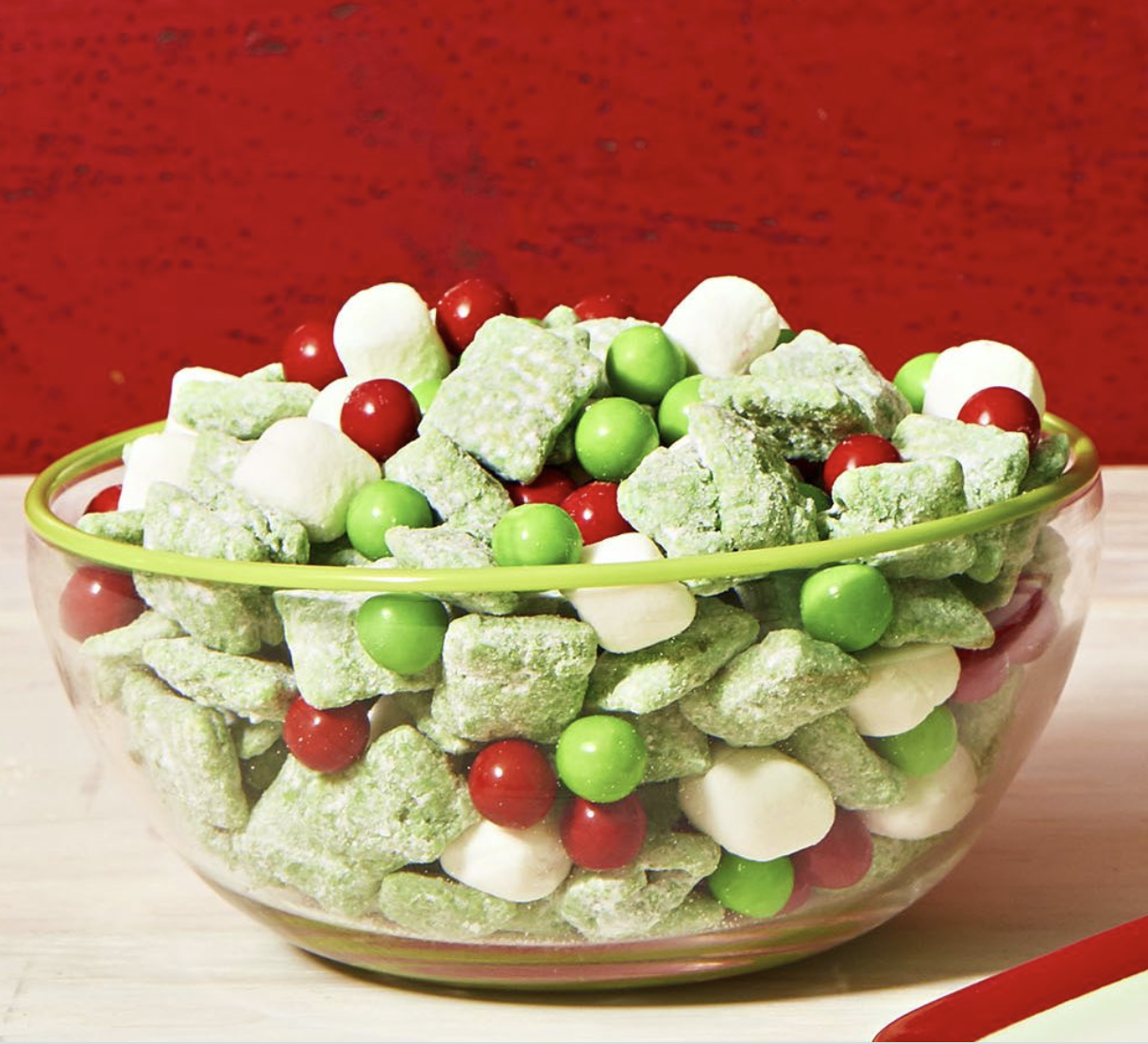 A bowl of red, green and white snacks