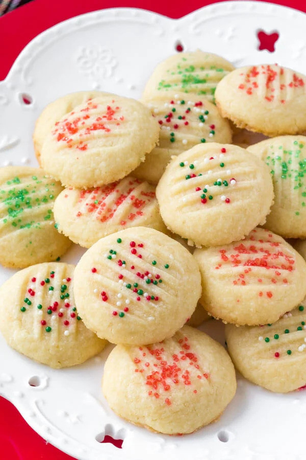 Shortbread cookies, with red and green sprinkles on top.